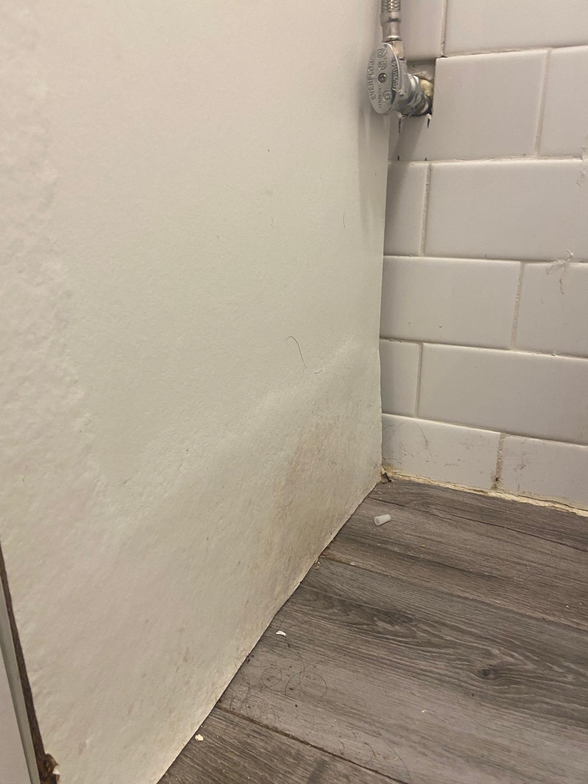 Storm floodwater standing across the floor of a below-grade Brooklyn space