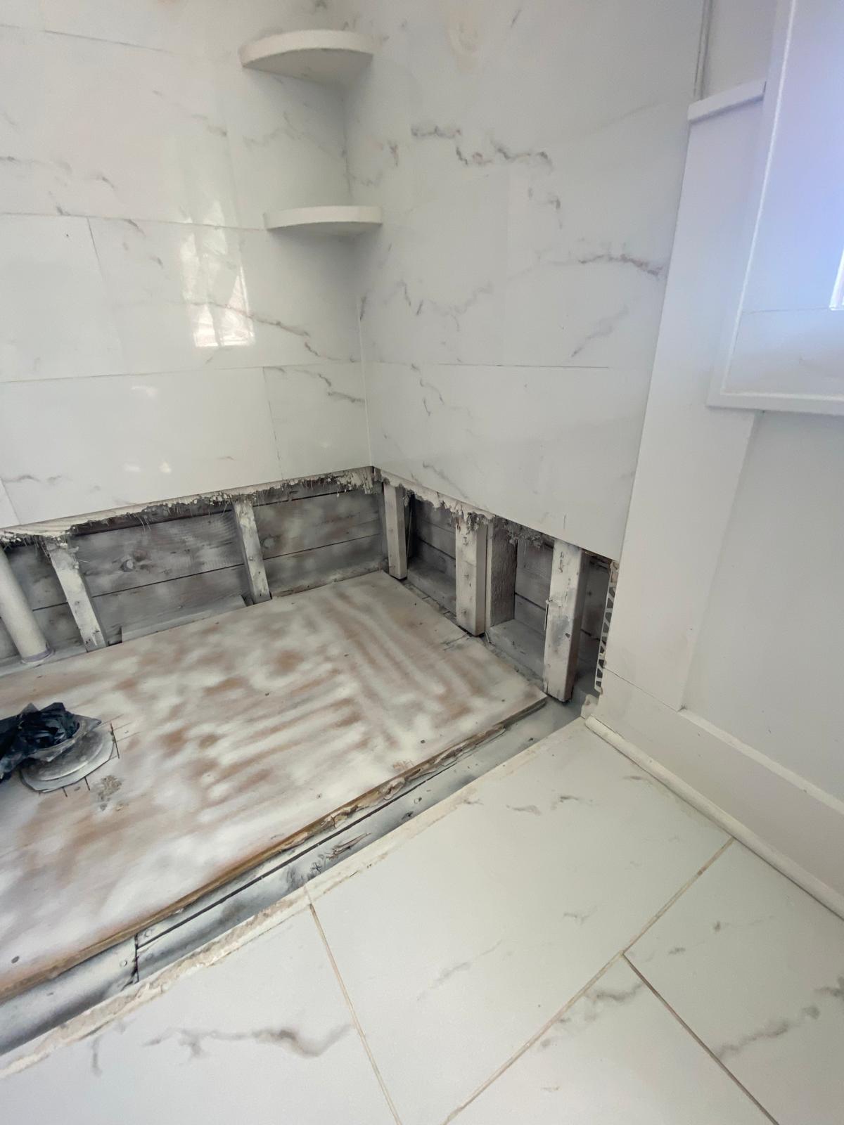 Ground-floor tenant-occupied unit being assessed after a storm flooding event